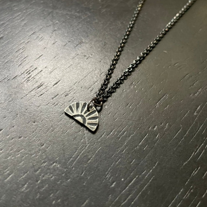 Tiny Silver Sunburst Necklace